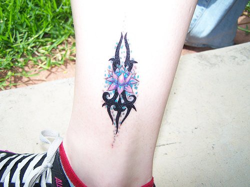 Designed rose ankle tattoo