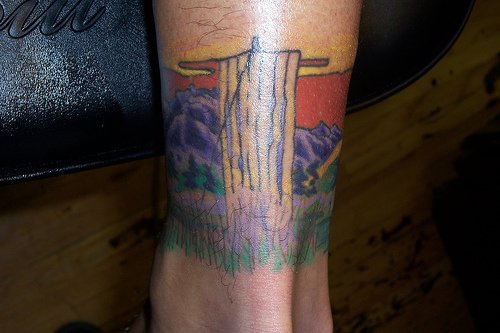 Landscape mountains ankle tattoo