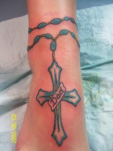 Daddy&quots cross ankle tattoo