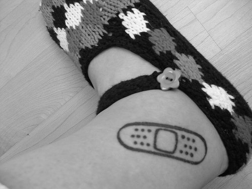 Slipper ankle tattoo