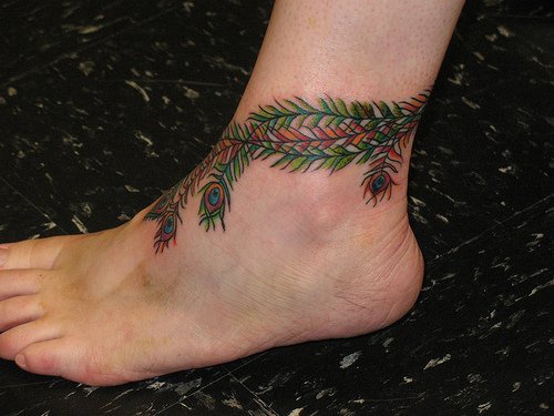 Peacock&quots feathers ankle tatto