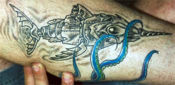 Hand tattoo with sword fish