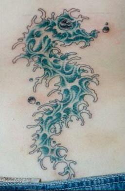 Water animal tattoo with blue seahorse