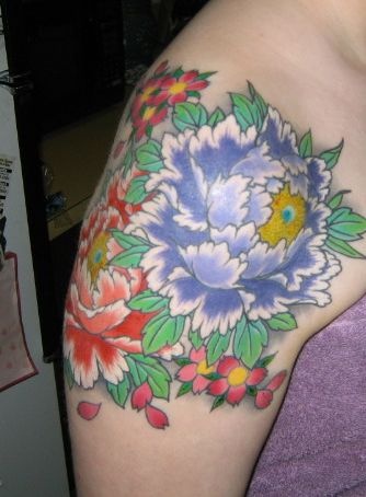 Tattoo von Nelken am Arm