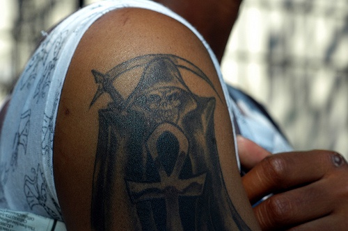 Death arm tattoo