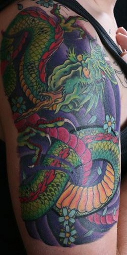 Big dragon arm tattoo
