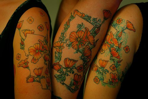 Tattoo von Mohnblumen am Arm