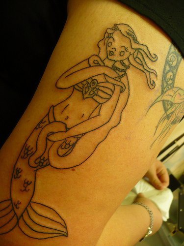 Mermaid arm tattoo