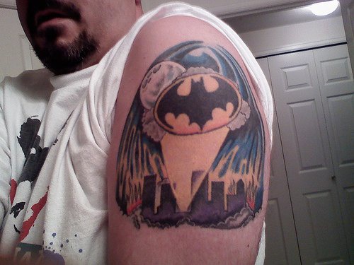 Bat in night city arm tattoo