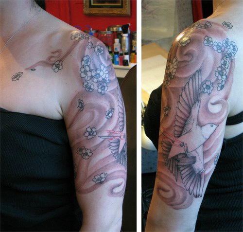 Wide and free  flight arm tattoo