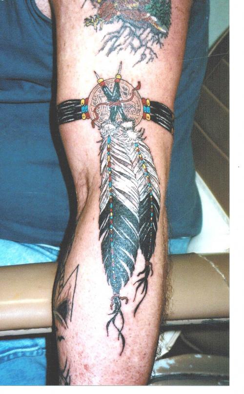 Qualitative indian arm band tattoo in colour