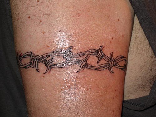 Fresh barb wire arm tattoo