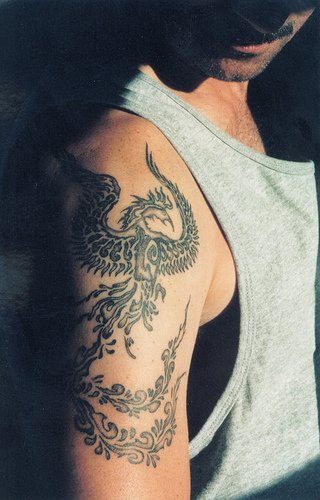 Tattoo von Feuervogel am Arm