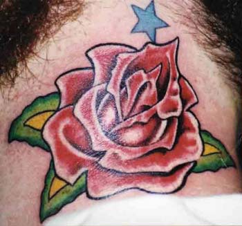 Red flower with erotic allusion tattoo