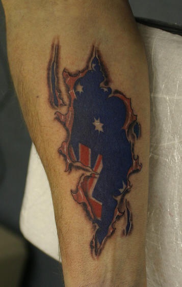 Australian flag under skin rip tattoo
