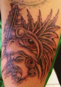 Warrior with pyramid on background tattoo