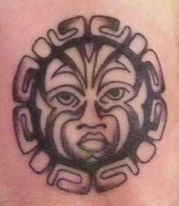 Primitive aztec sun symbol tattoo