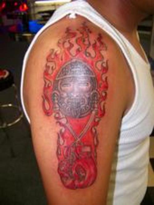 Aztec god of war coloured tattoo