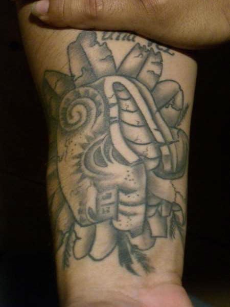 Aztec stone snake tattoo