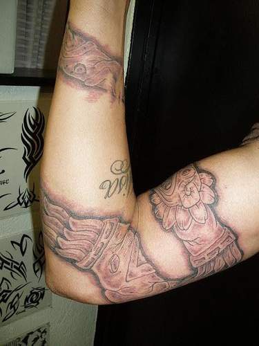 Aztec snake sleeve tattoo