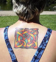Abstract square coloured tattoo on back