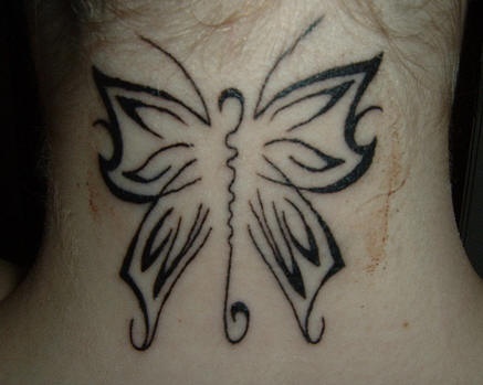 Tribal butterfly tattoo on neck
