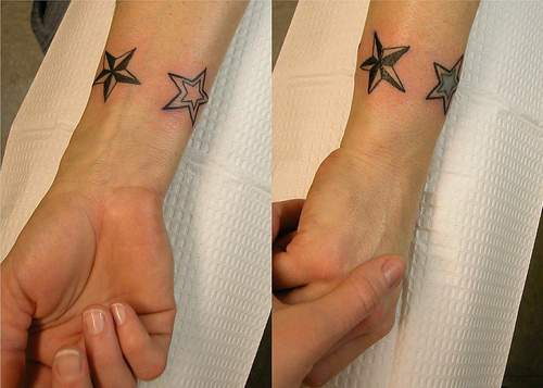 Black stars armband tattoo