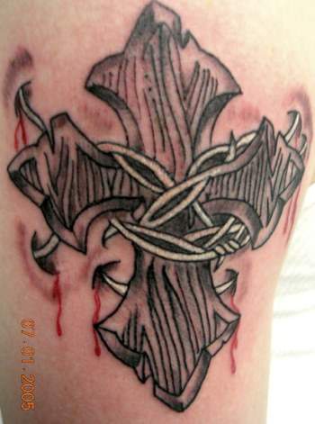 Barb wired cross with blood tattoo