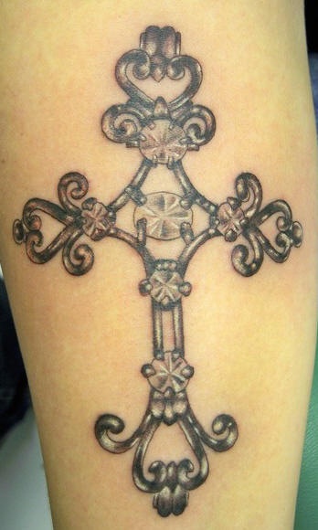 Bejeweled cross qualitative tattoo