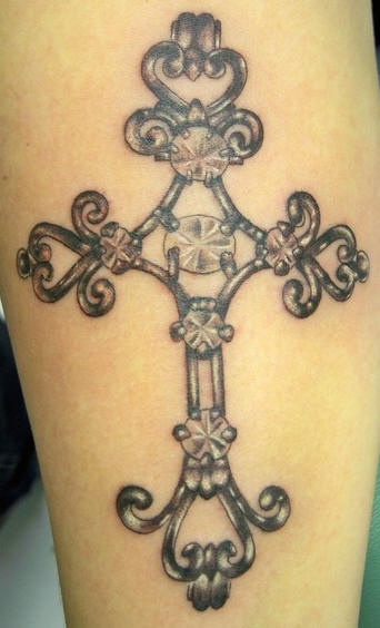 Beautiful  bejeweled cross tattoo