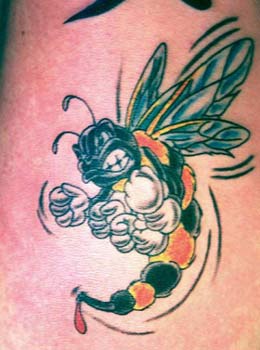 Colourful wasp boxer tattoo