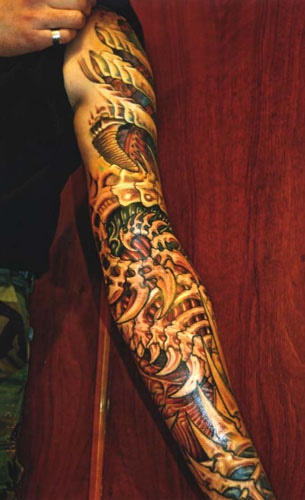 Amazing biomechanical right arm tattoo