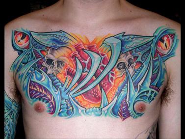 Biomech serpent tattoo on chest
