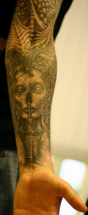 Giger style biomechanical tattoo