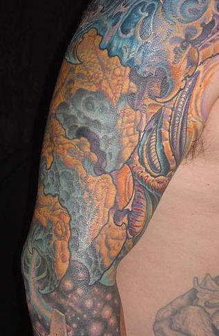 Coloured artwork tattoo on arm