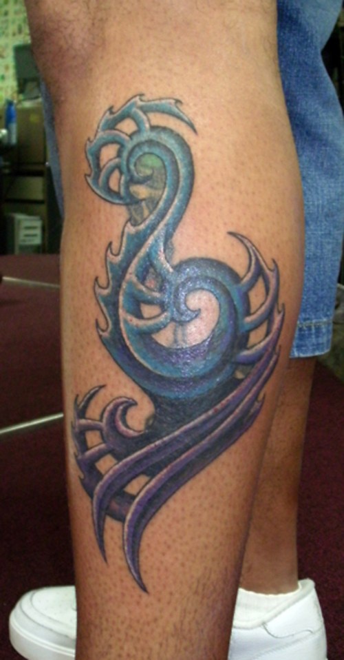 Biomech spirals leg tattoo