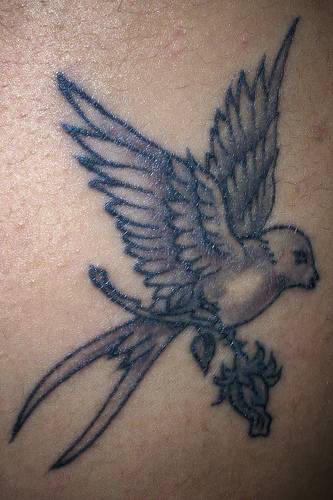 Sparrow on tree tattoo