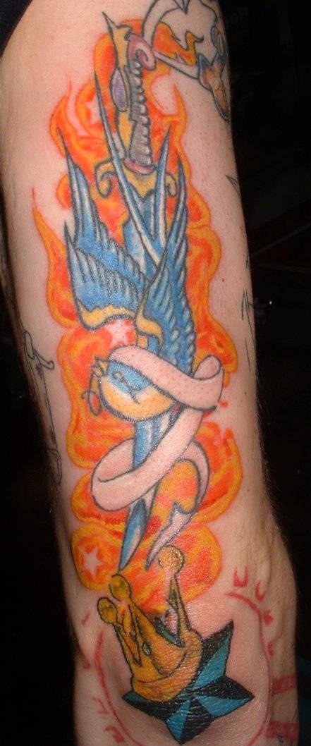King bird on flaming knife tattoo