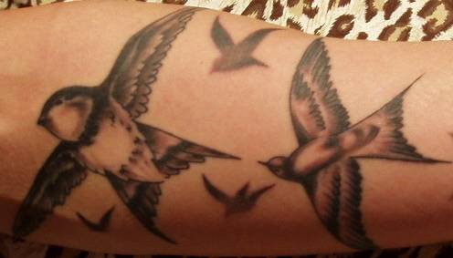 Traveling birds black tattoo