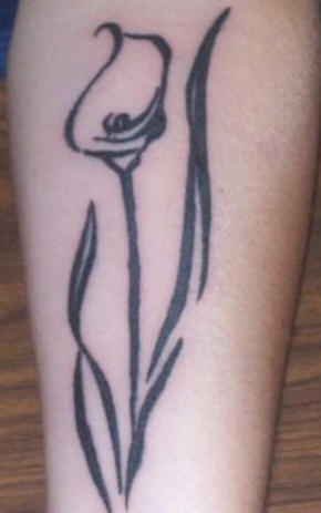 Minimalistic calla lily tattoo