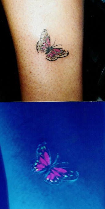 Glowing butterfly coloured tattoo