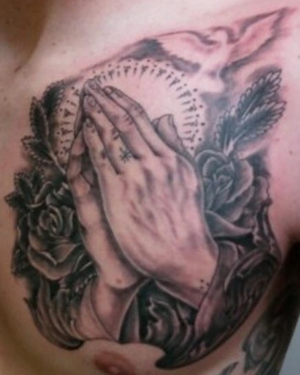 Amazing praying hands tattoo