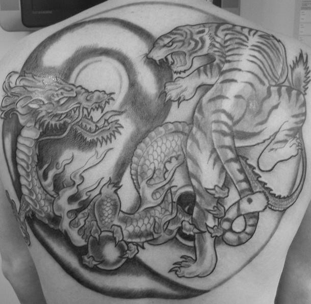 Epic fight tider versus dragon black tattoo