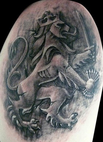 Heraldic lion tattoo in black