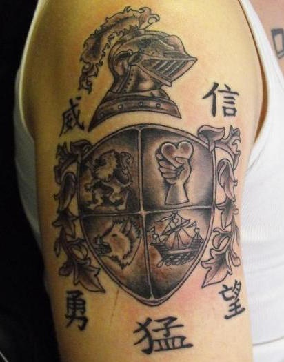 Heraldic shield black ink tattoo