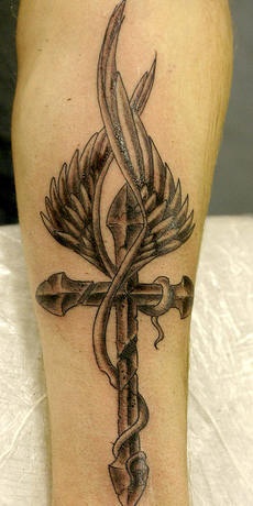 Detailed winged cross black ink tattoo