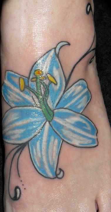 Tender blue lily foot tattoo