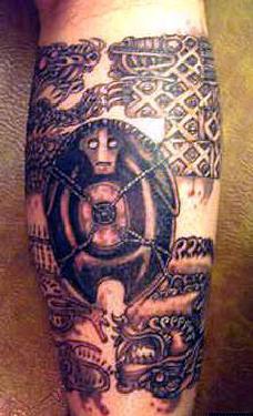 Highly detailed tribal symbols tattoo