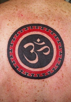 Buddhist symbol red and black ink tattoo