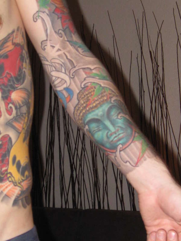 Crying blue buddha arm tattoo